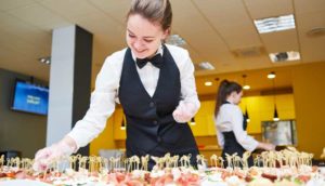 Restaurant specialist preparing a buffet