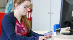 Student at a computer workstation