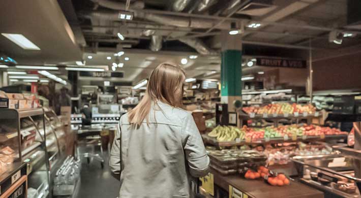 Student while shopping in a supermarket