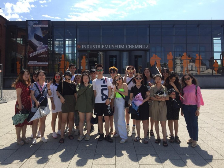 Group of students from Chongqing / China standing in front of the Industrial Museum