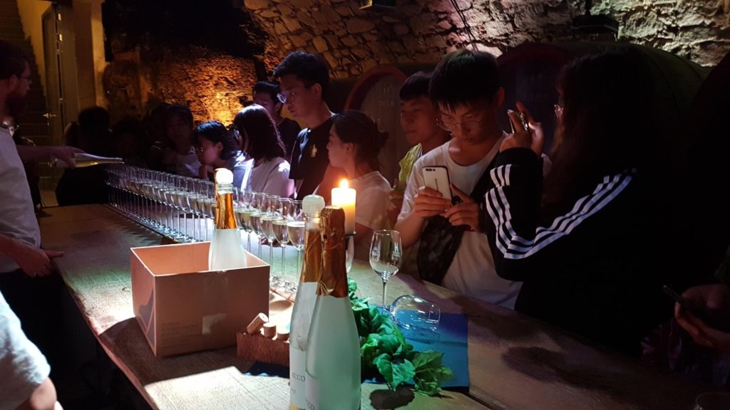 Students of the Shanxis Business Group during a wine tasting.